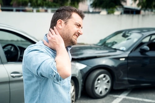 Injured driver has neck pain and needs a car accident lawyer