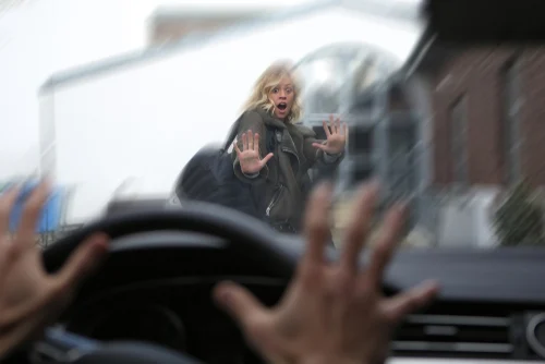 driver speeds toward woman who needs a pedestrian accident attorney