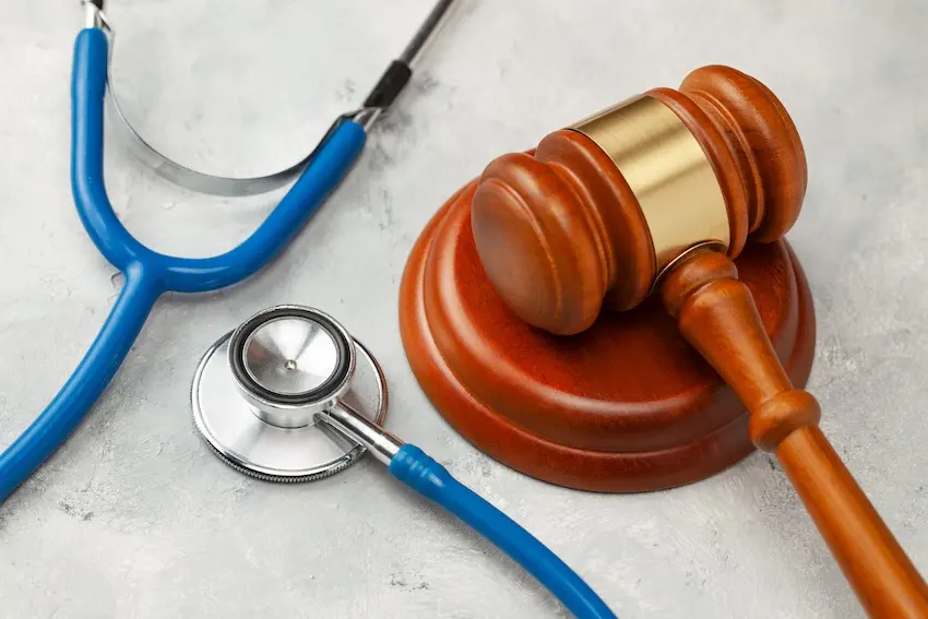 A legal gavel with a medical stethoscope representing dog bite laws and personal injury claim proceedings at NC Injury Law in North Carolina.