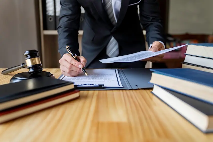 NC Injury Law motorcycle accident lawyer reviewing evidence and building a case to fight insurer bias on a North Carolina motorcycle accident claim